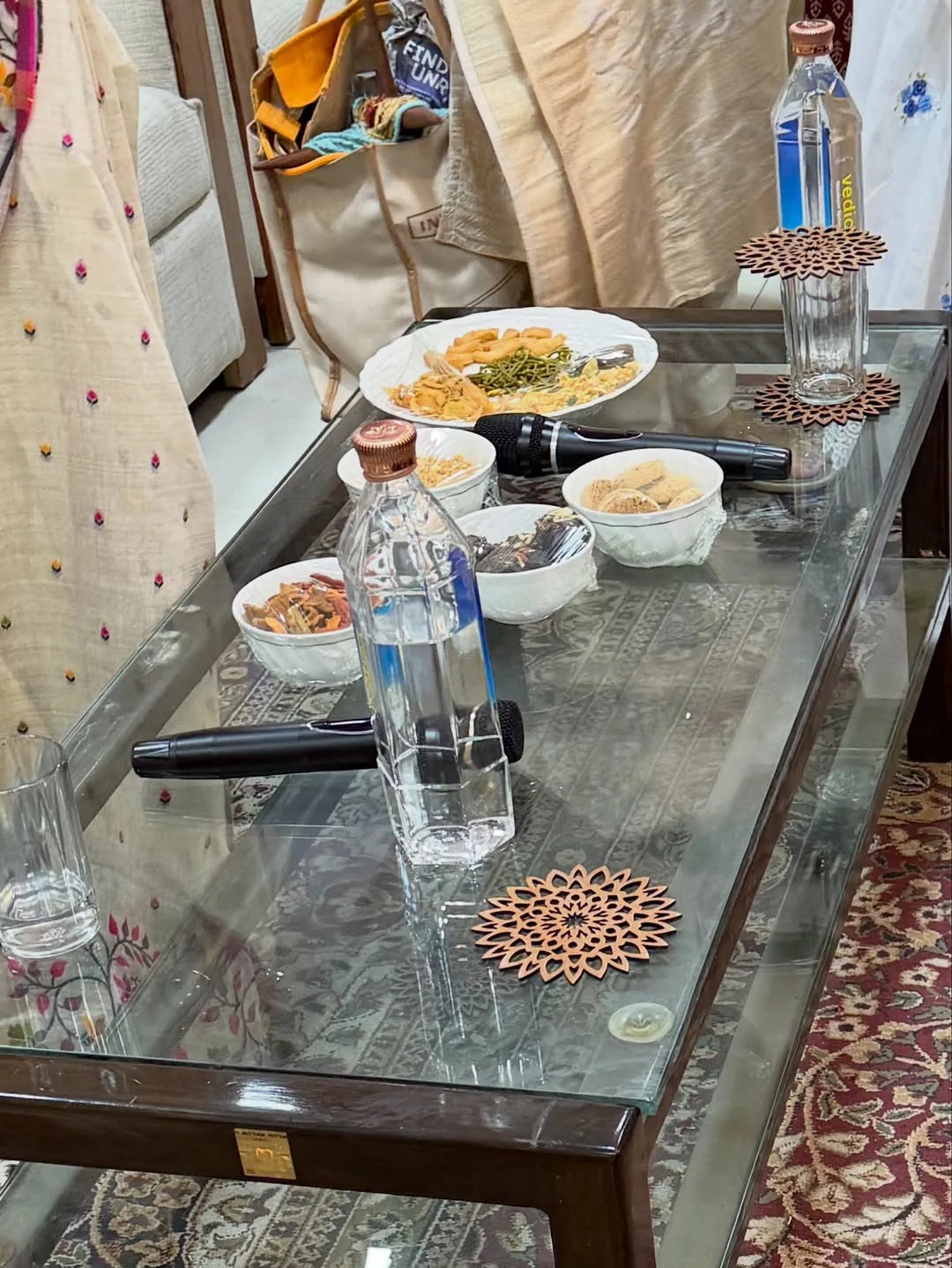 AD'NOVEL tea coasters used on a coffee table to present water