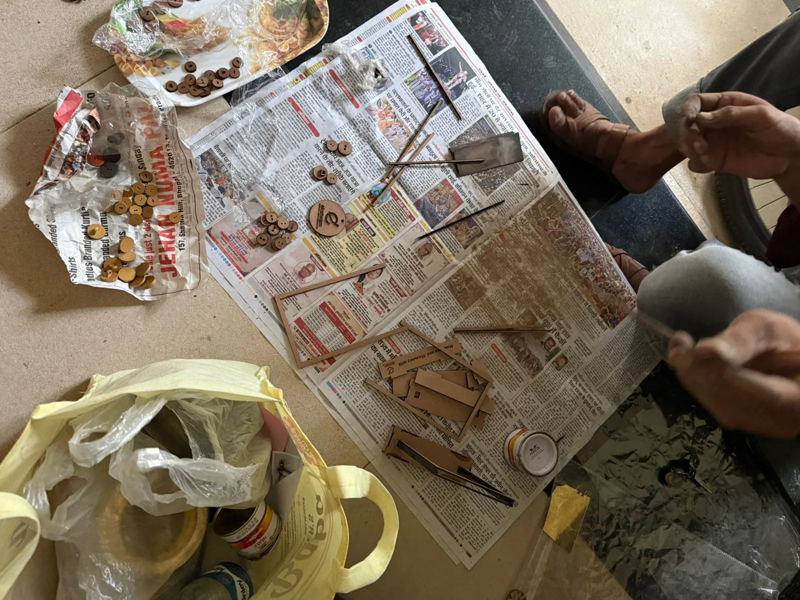 AD’NOVEL artisans finishing wooden pieces by hand